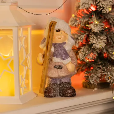 Новогодняя фигурка Мальчик с лыжами фарфоровая 12*10*22 см Новогодняя фигурка Мальчик с лыжами фарфоровая 12*10*22 см