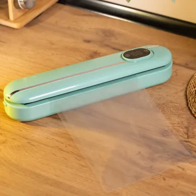 Вакууматор Vacuum Sealer для домашнего использования 300 Вт 10 пакетов в комплекте, бирюзовый Вакууматор Vacuum Sealer для домашнего использования 300 Вт 10 пакетов в комплекте, бирюзовый