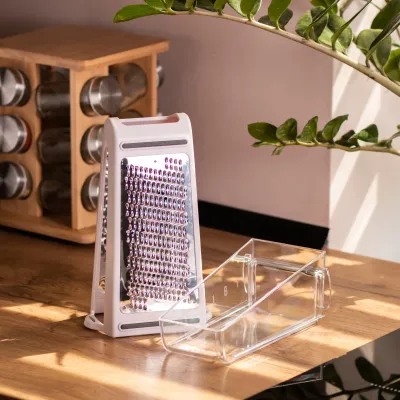 Терка двусторонняя с пластиковым контейнером 11*8*22 см, белый Терка двусторонняя с пластиковым контейнером 11*8*22 см, белый