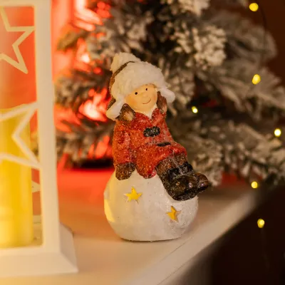 Новорічна фігурка з підсвіткою Дівчинка на сніжній кулі 9,5*8*16 см Новорічна фігурка з підсвіткою Дівчинка на сніжній кулі 9,5*8*16 см